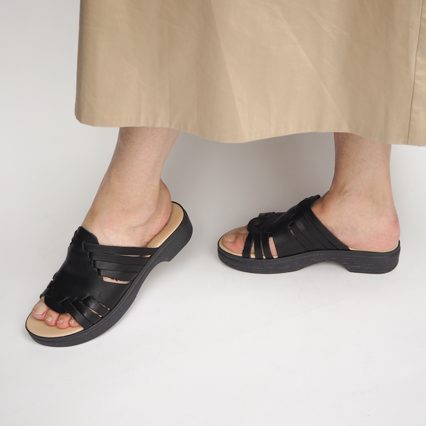 Andrea black leather clog on model calou stockholm