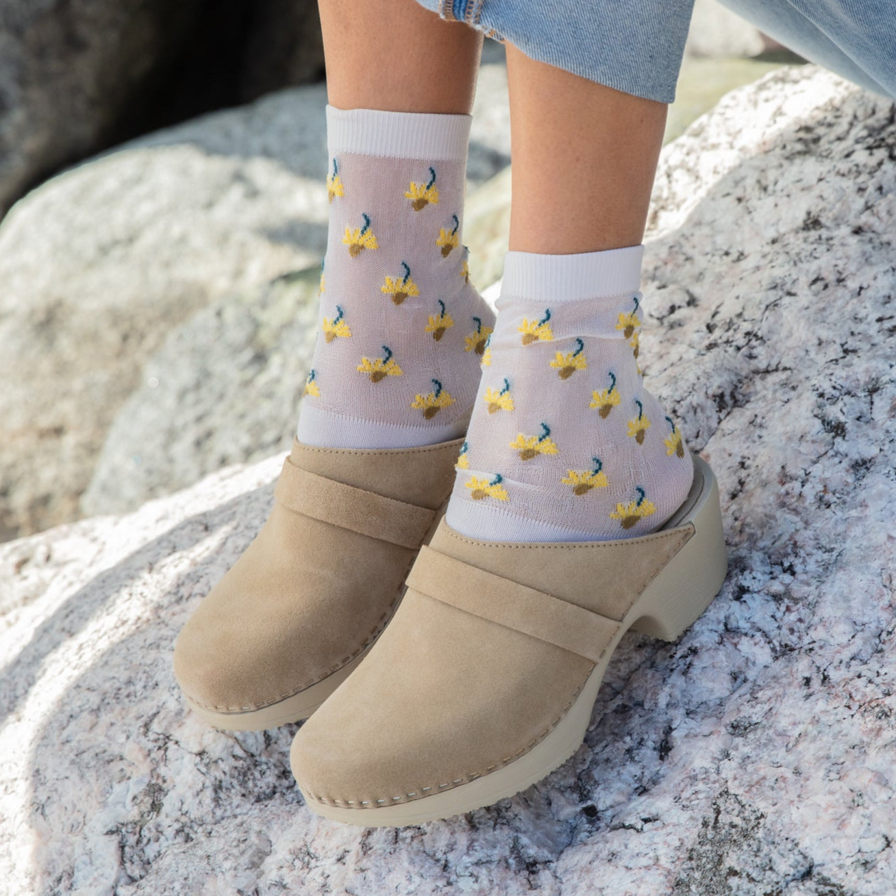 Annika beige suede clogs on model calou stockholm