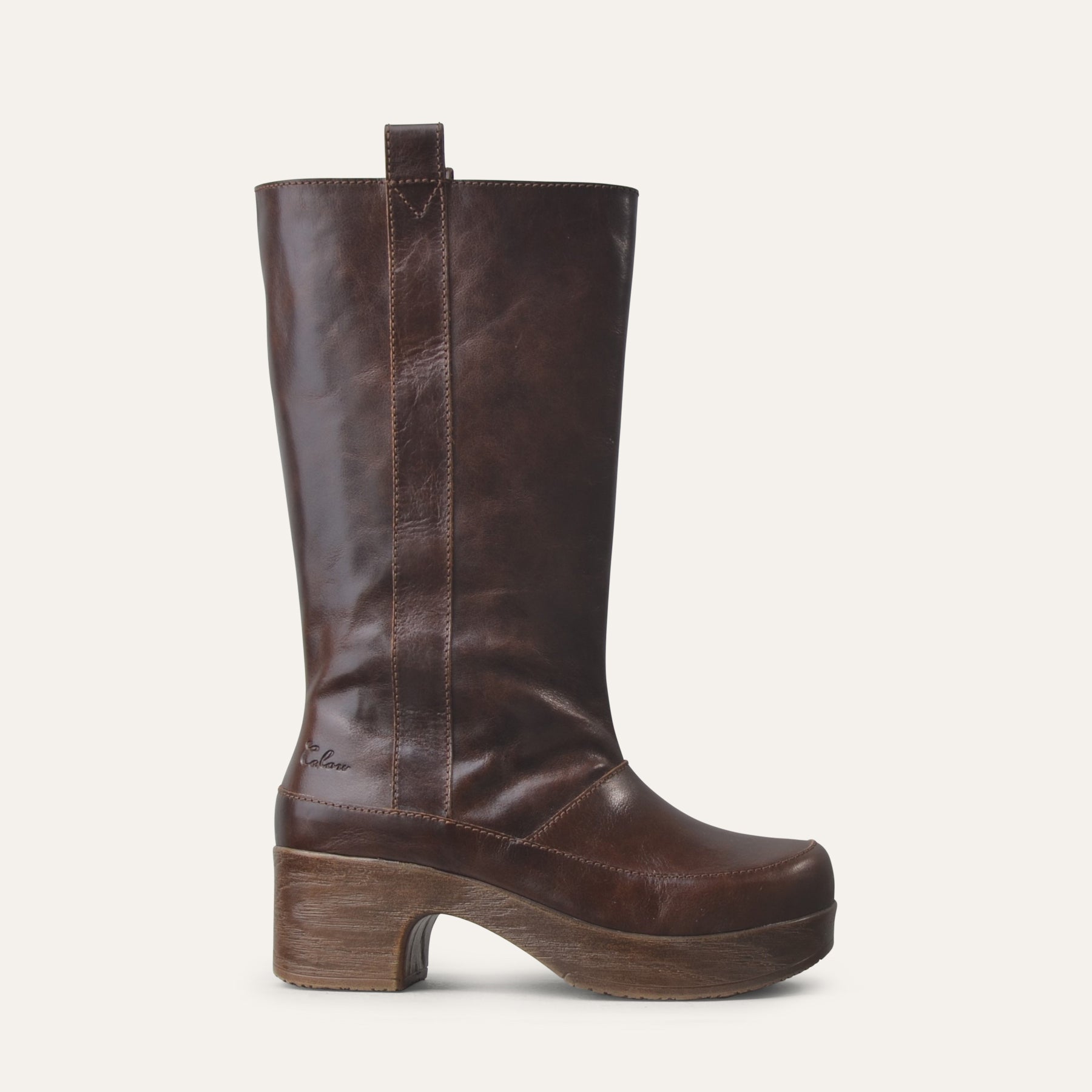 Brown leather wide shafted boot on a white background