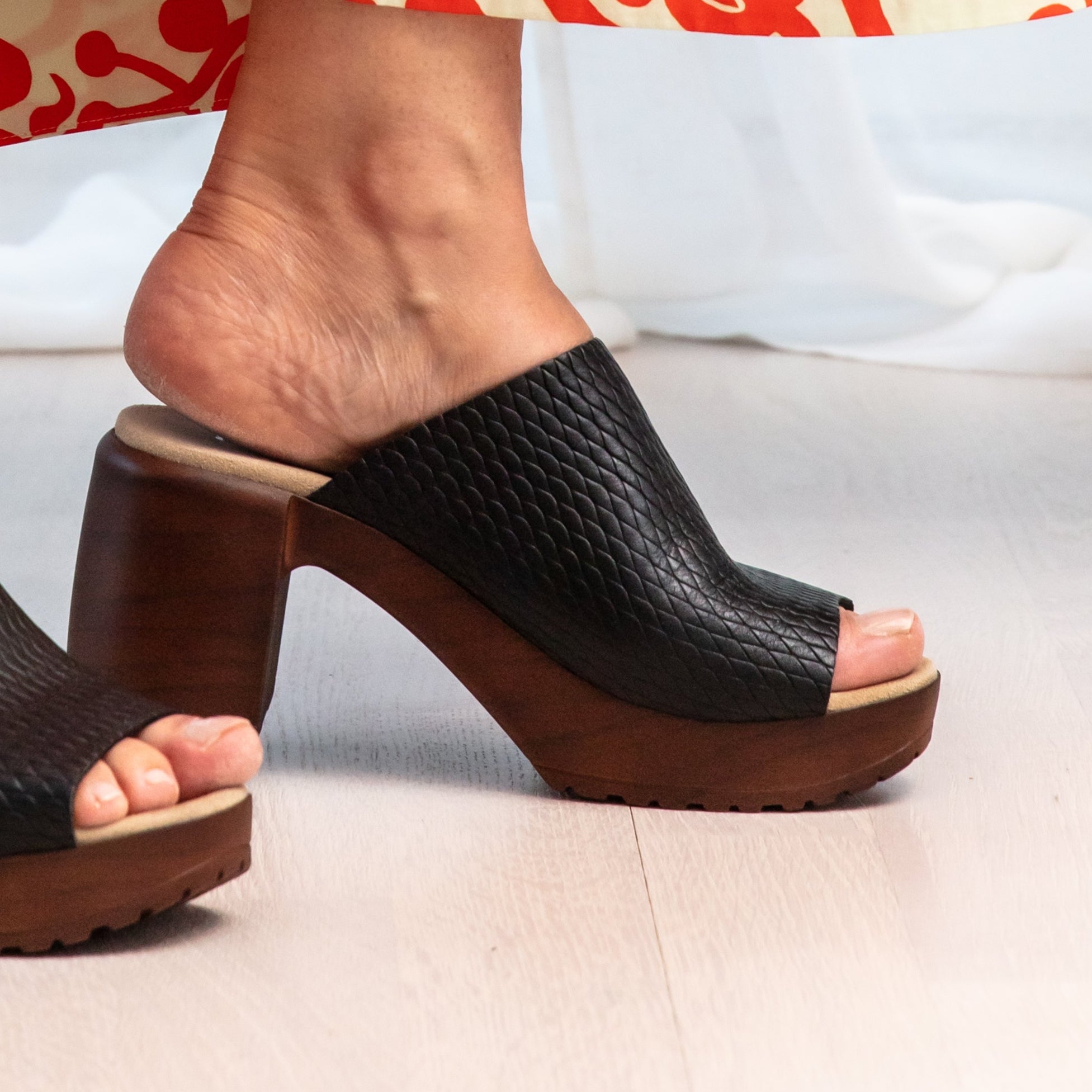 Becka black leather clog sandals on model Calou Stockholm