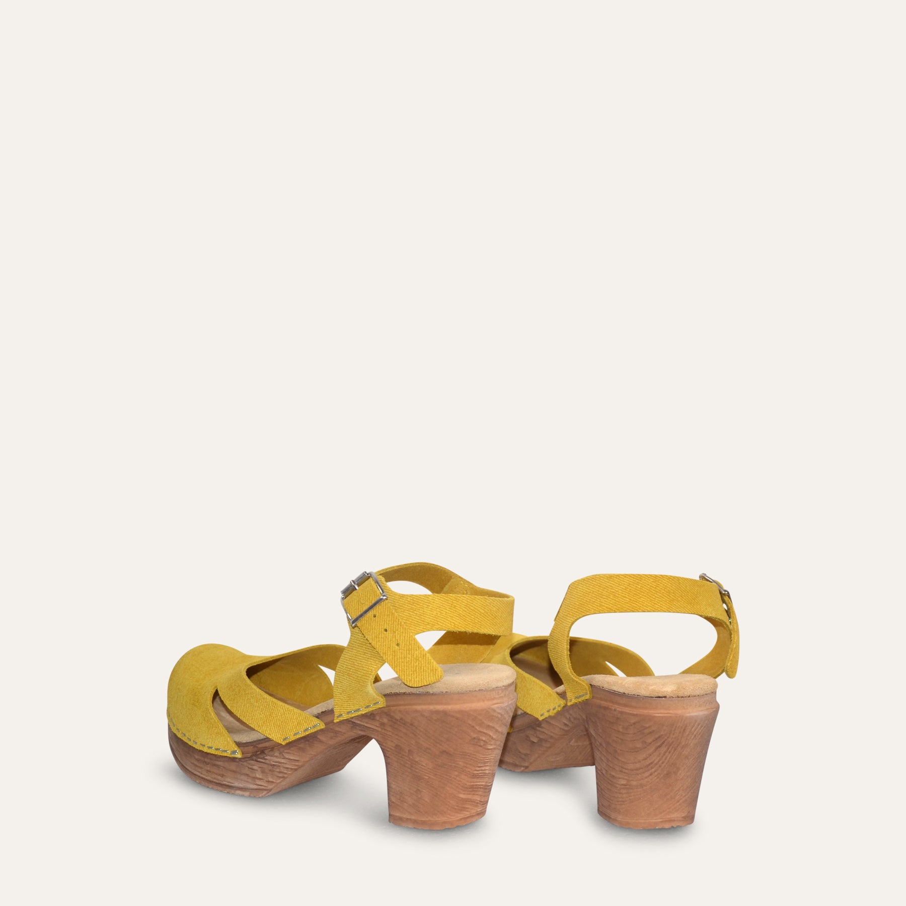 Yellow suede clogs with wood-look sole by Calou backview