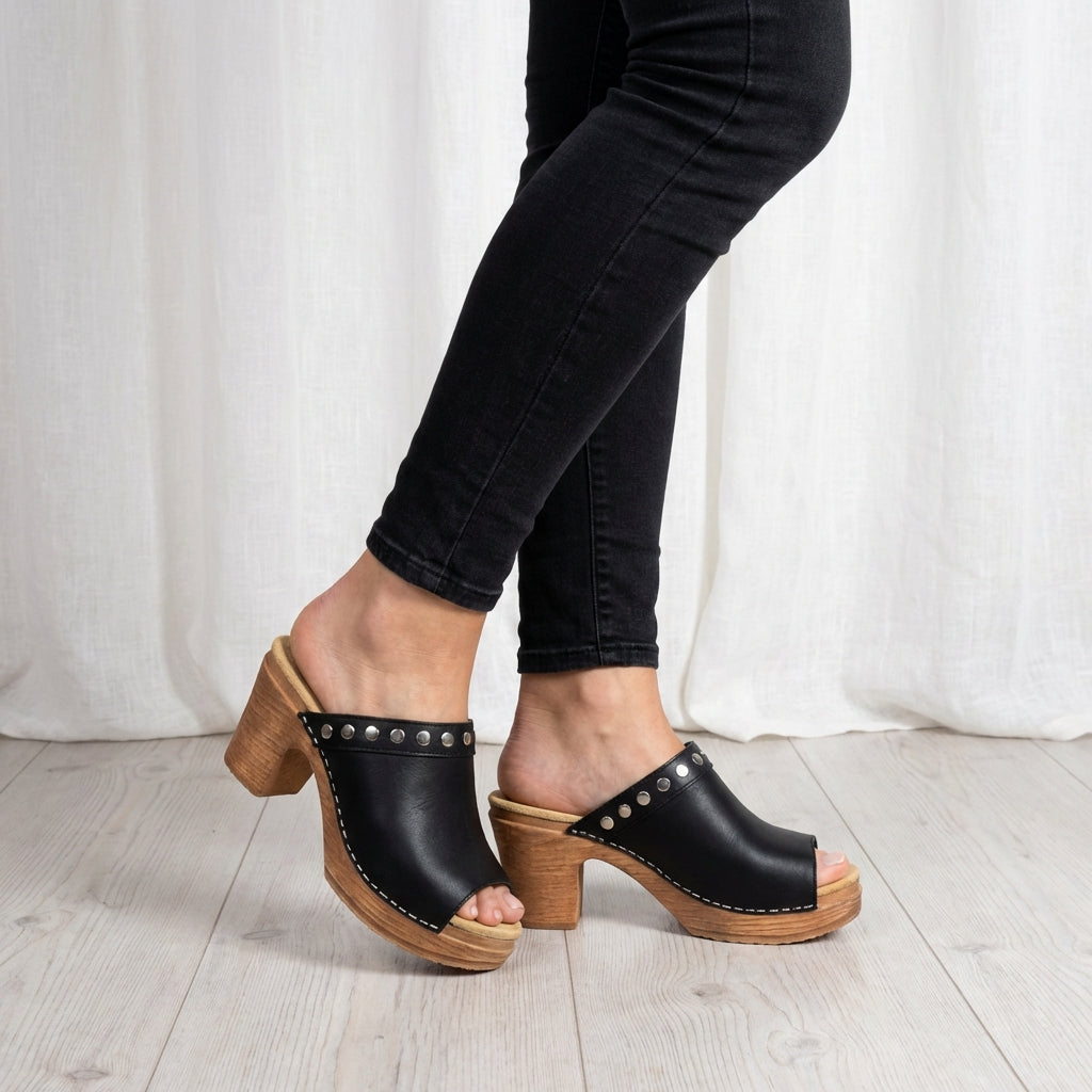 Calou Felicia black heeled clog sandals with decorative studs on soft flexible soles