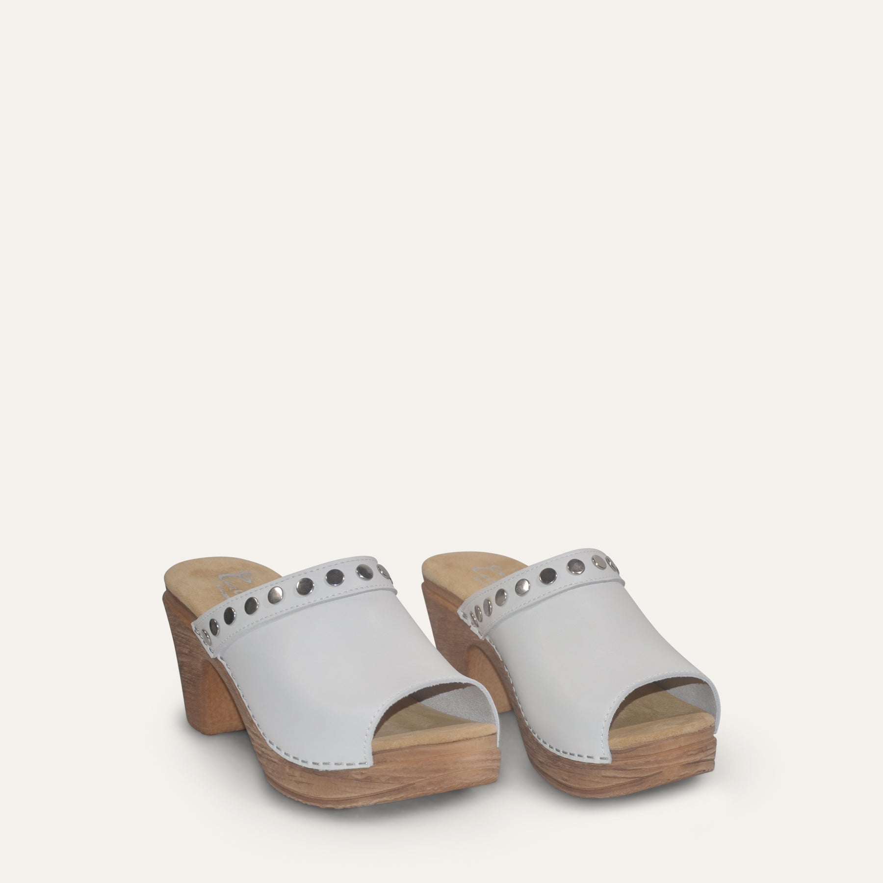 Calou Felicia white clogs decorated with studs on soft flexible soes, front