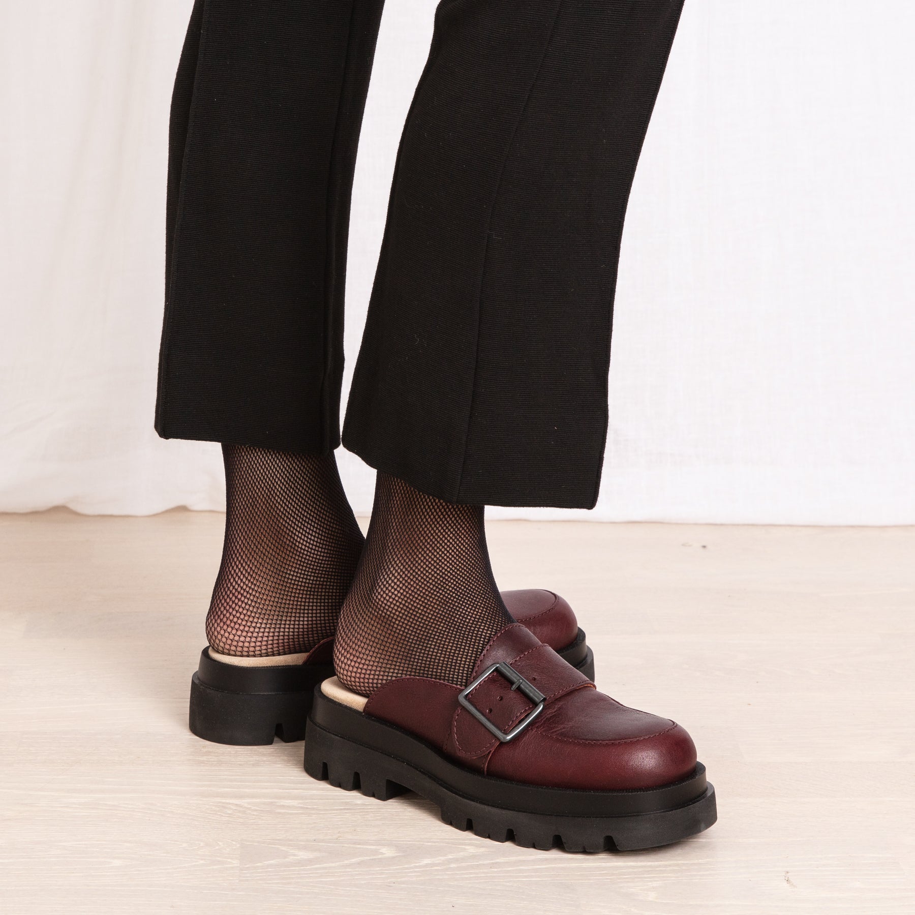 Gloria plum leather clog loafers on model Calou