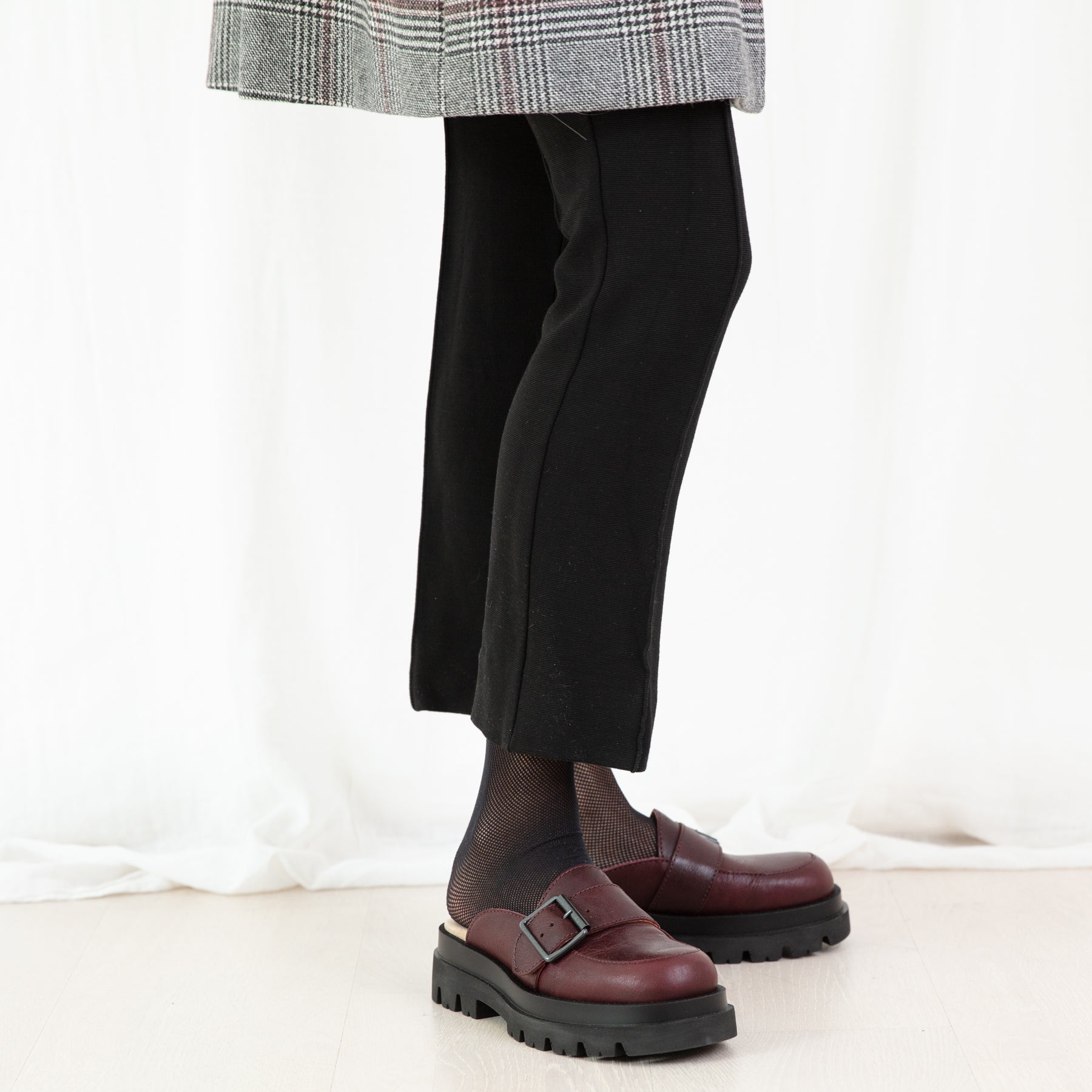 Gloria plum leather slip on loafer shoe on model Calou