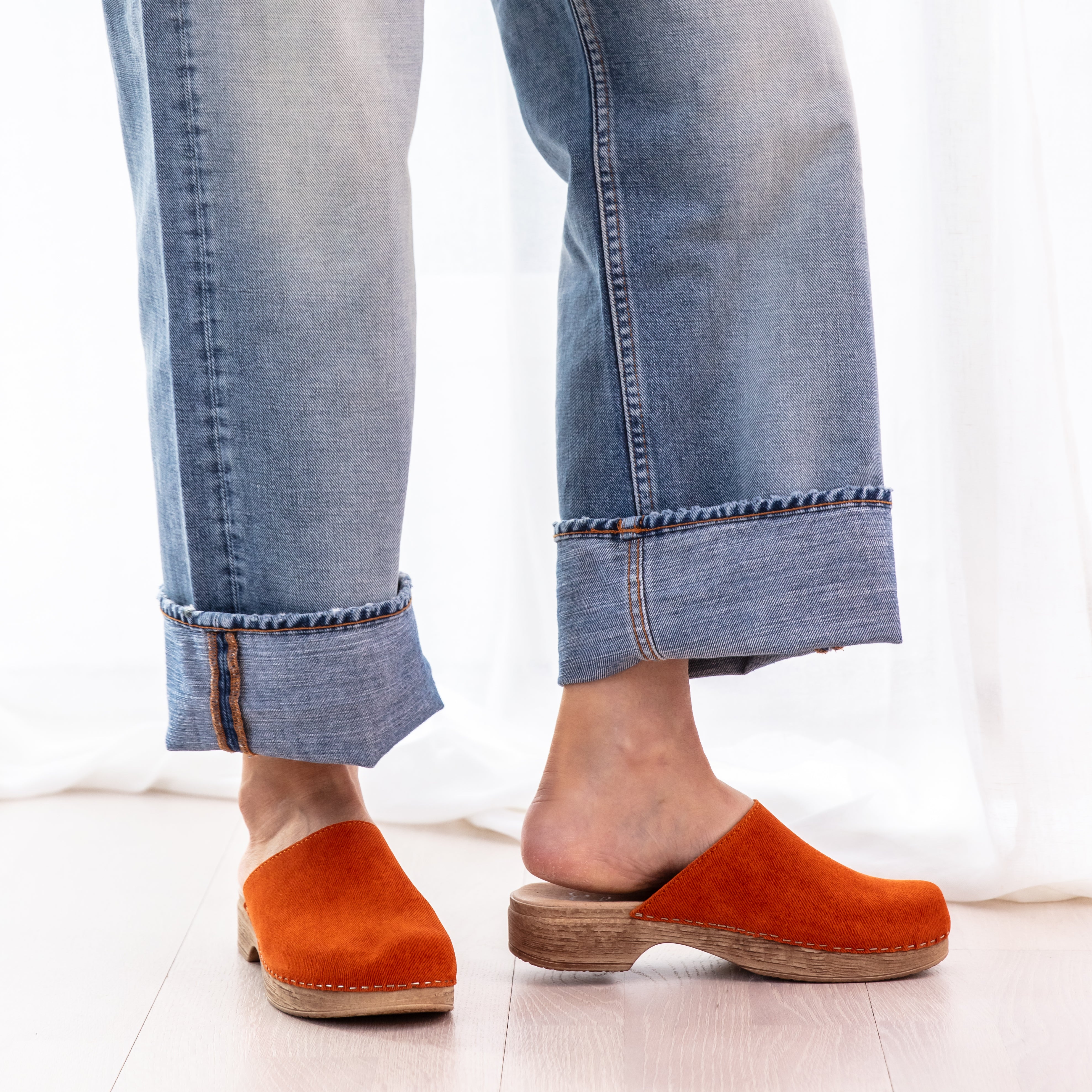 Helena orange suede classic clogs on model Calou Stockholm