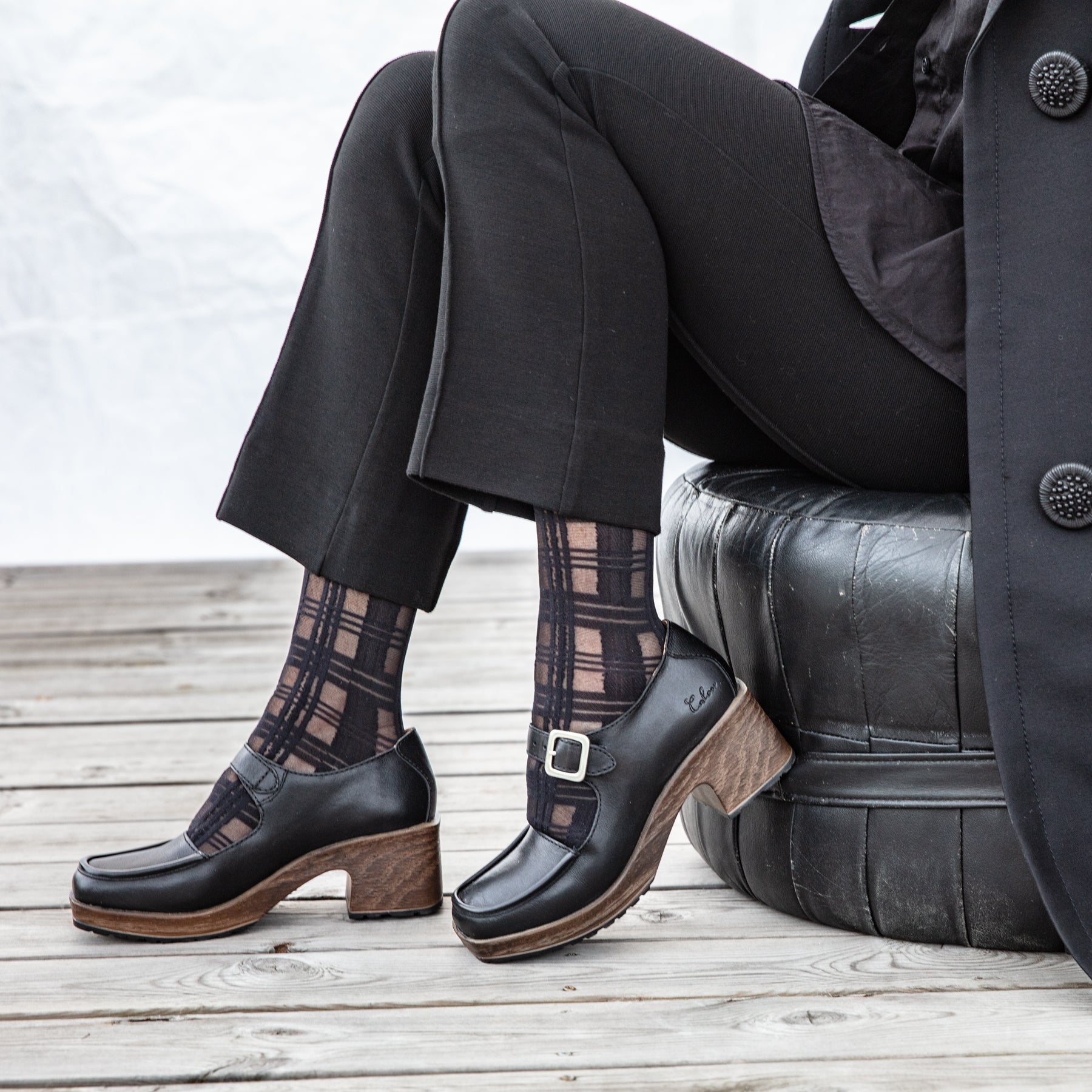 Iwa black leather mary jane clog shoe on model calou stockholm