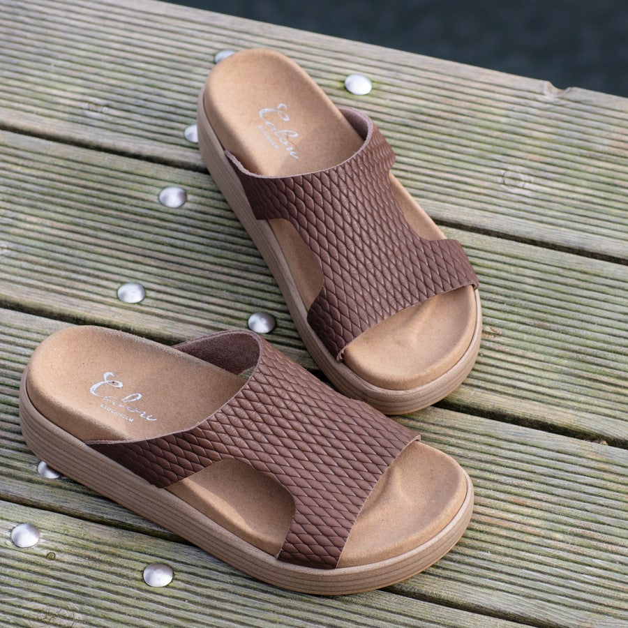 Lilja brown leather clog sandals on pier, Calou Stockholm