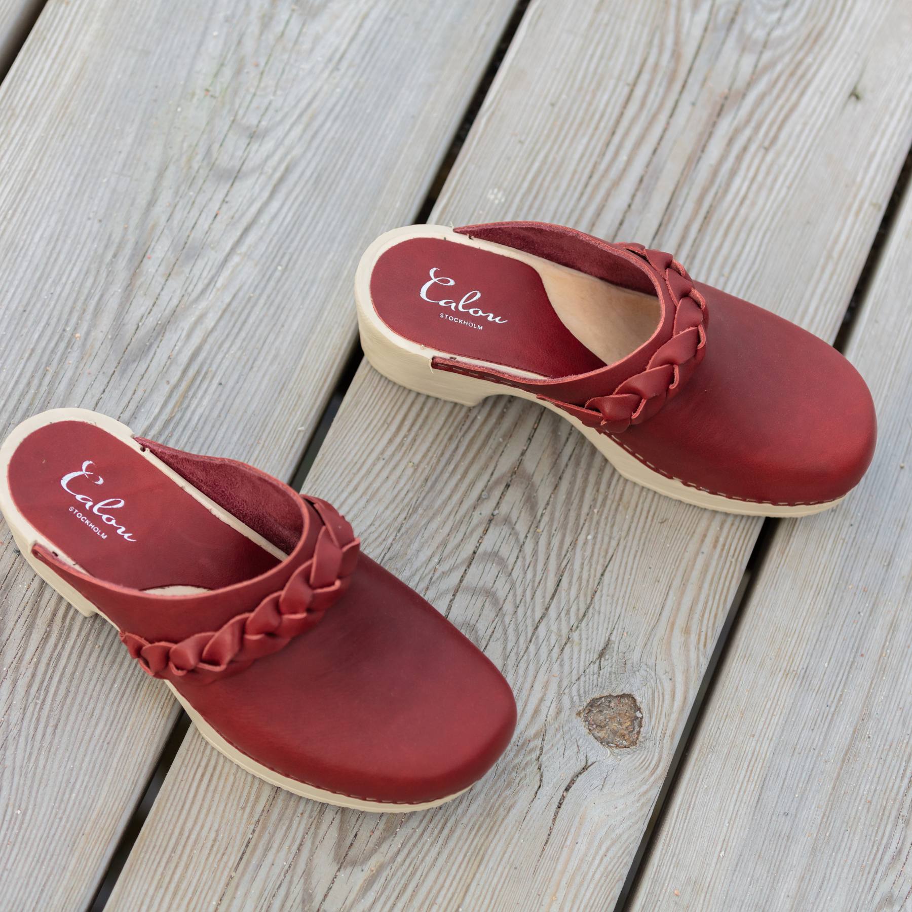 Lotta red leather clogs on pier, Calou Stockholm