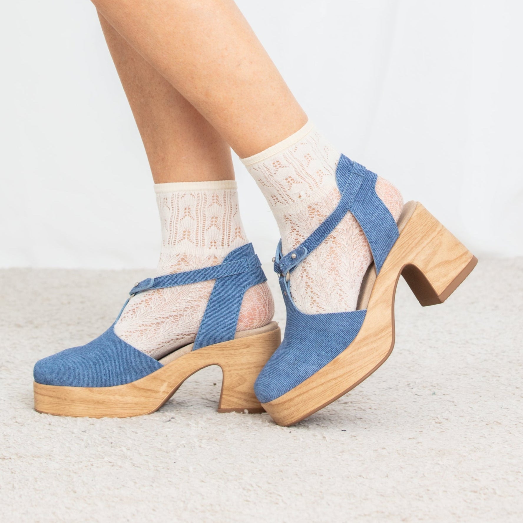 Majsan denim blue suede clogs on model Calou