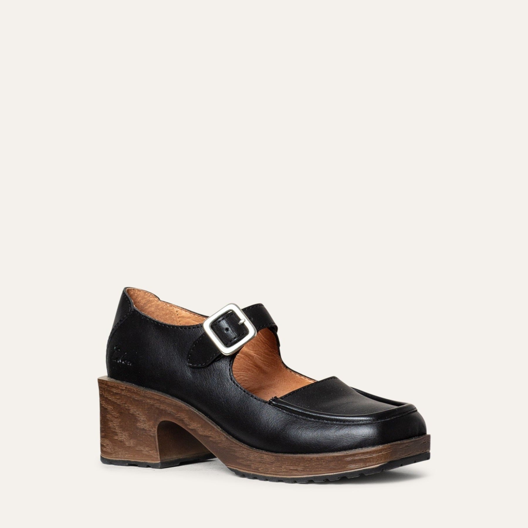Calou Iwa Black leather Mary Jane clog with a buckle strap and Calou’s soft, flexible, cushioned sole.