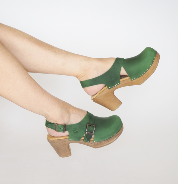 Astrid green leather clog on model