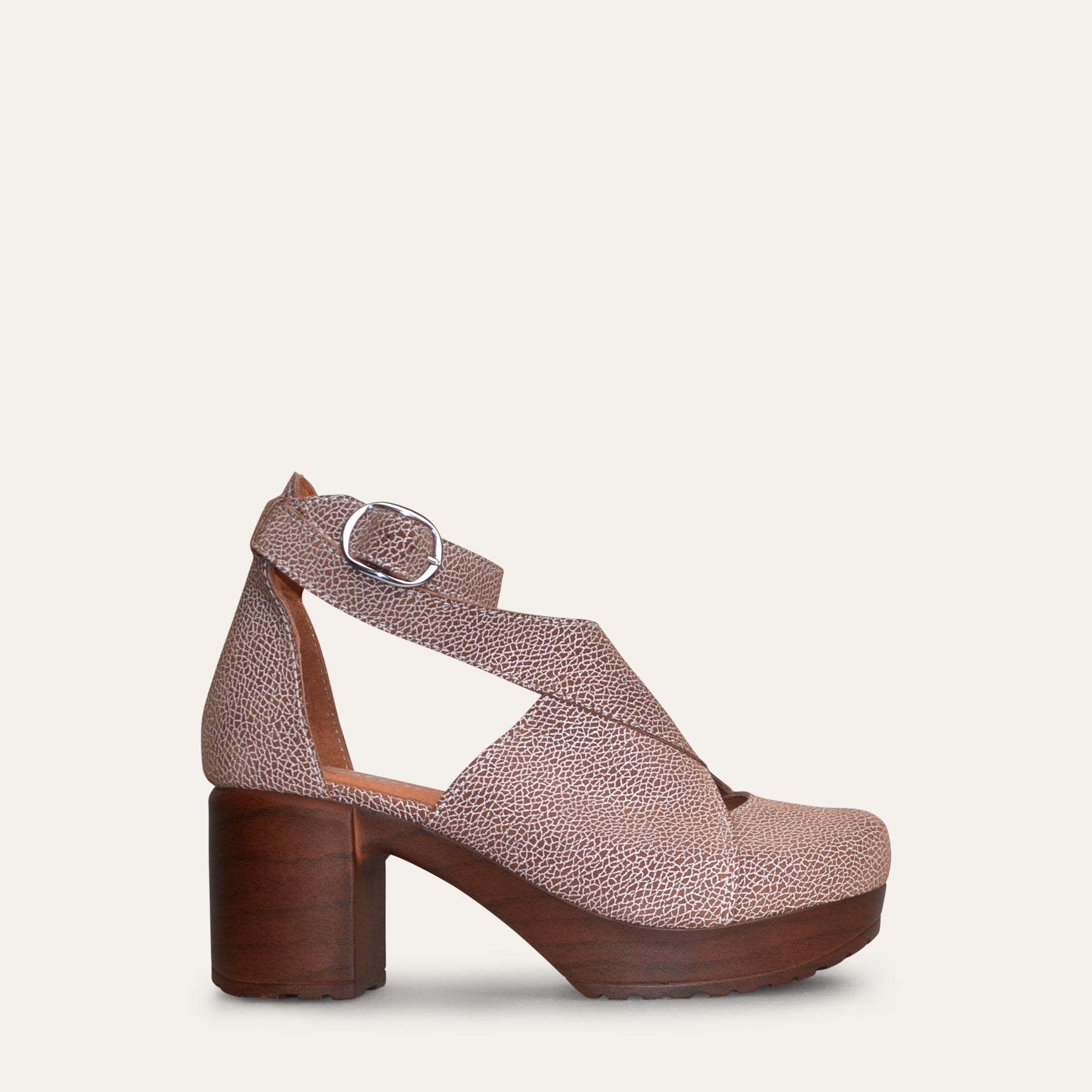 Brown textured leather slingback clog with cross straps and flexible sole high heel by Calou.