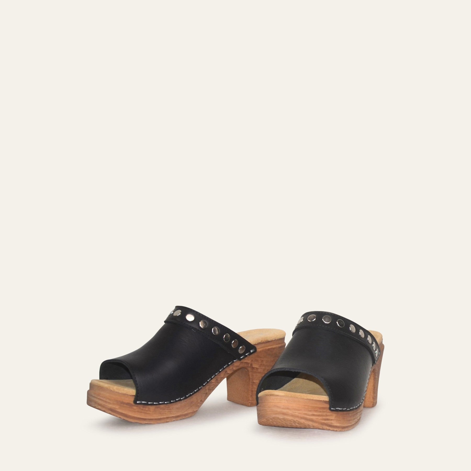 Calou Felicia black mules with studs on soft flexible soles, frontview