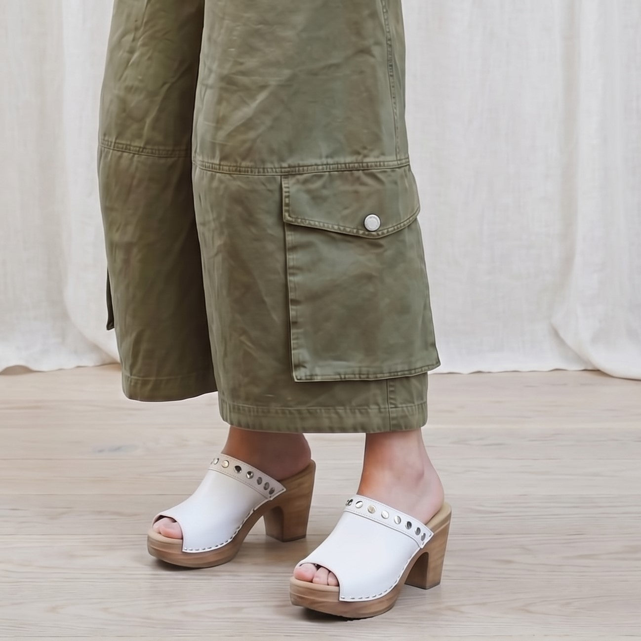 Calou Felicia open toe clogs with decorative studs along opening on flexible soft soles