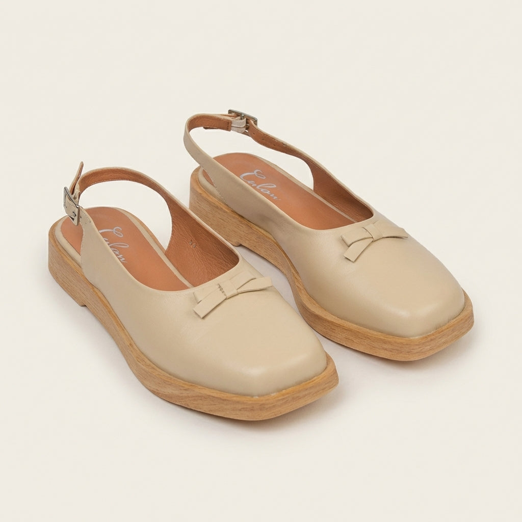 Calou Lollo beige slingback sandal with bow on top. made on flat base