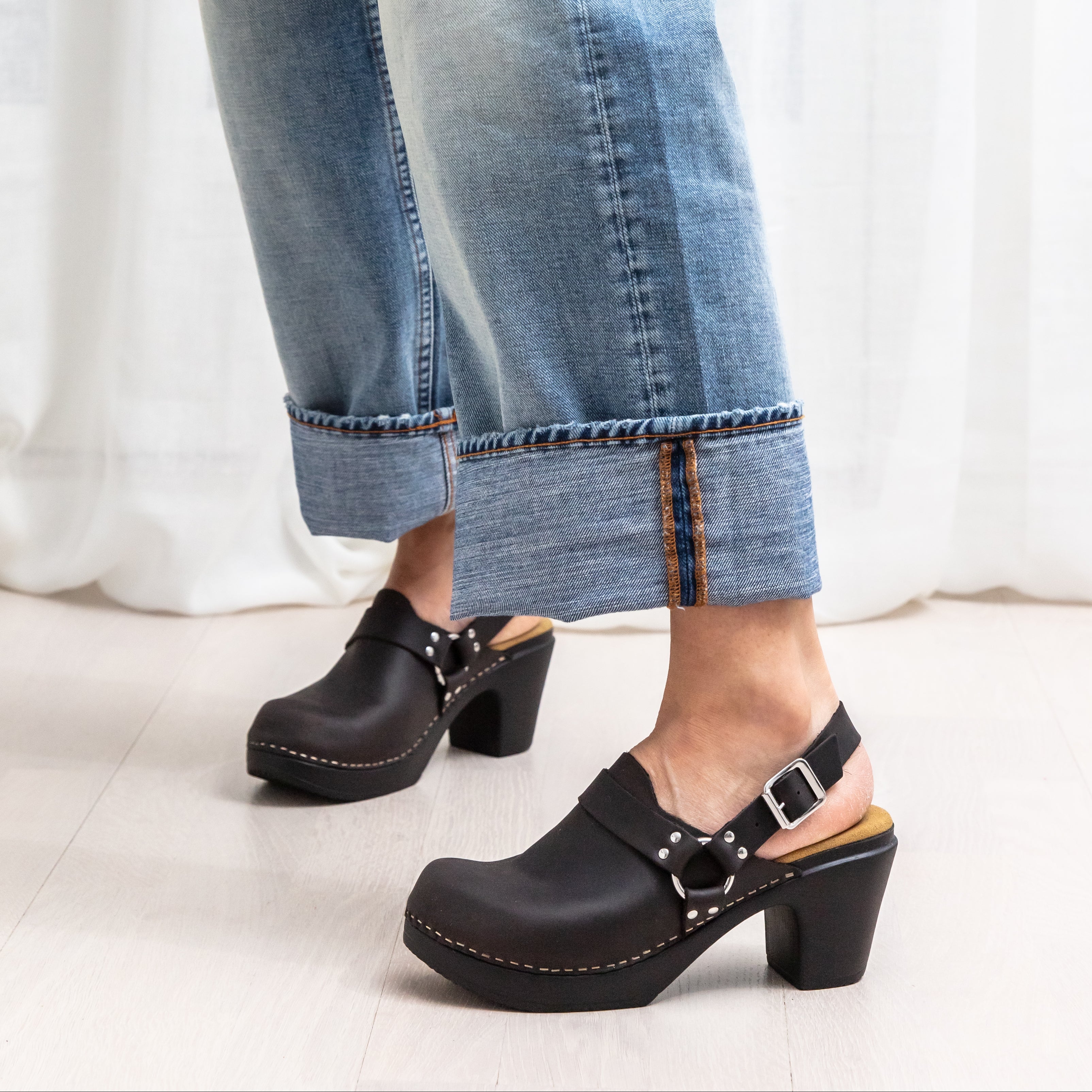 Tindra black leather slingback clogs on model, Calou Stockholm