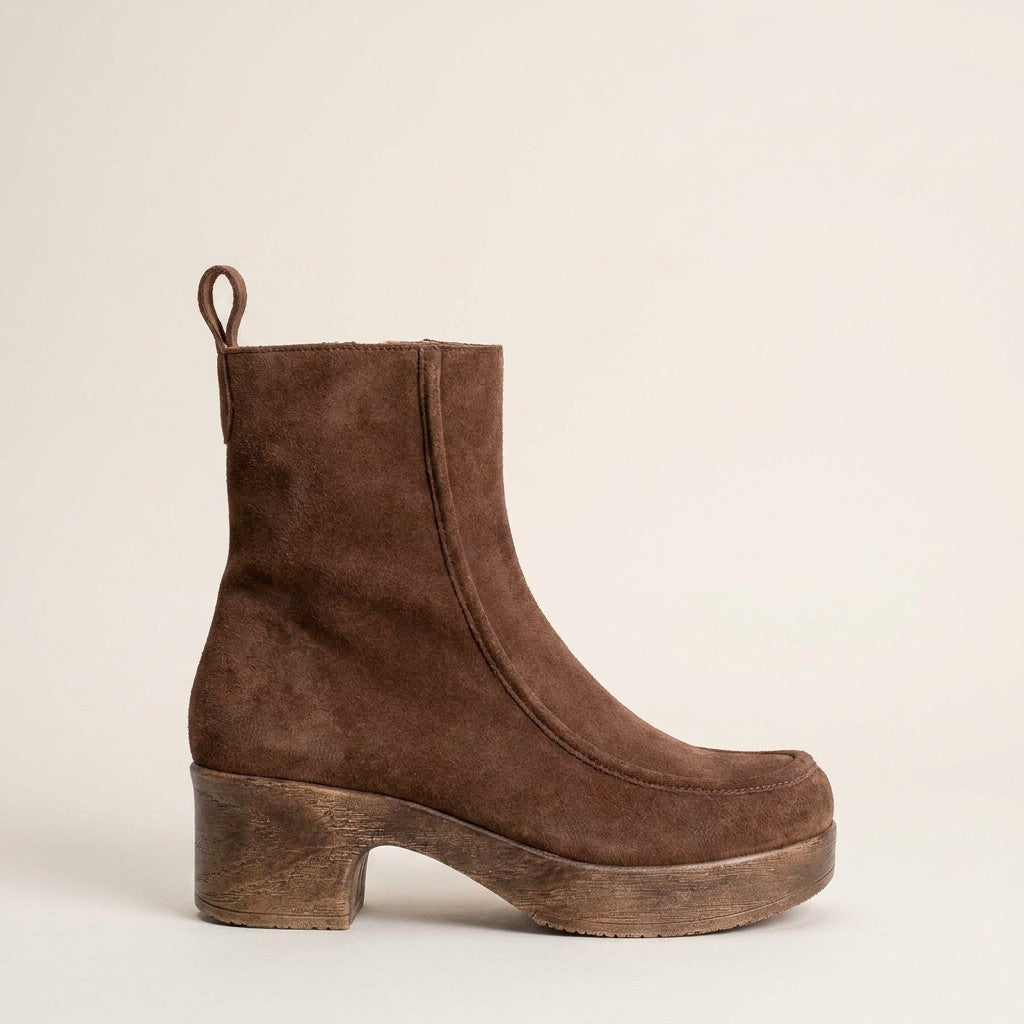 Brown suede platform clog boot with a wood-look heel and Calou’s soft, flexible, cushioned sole.