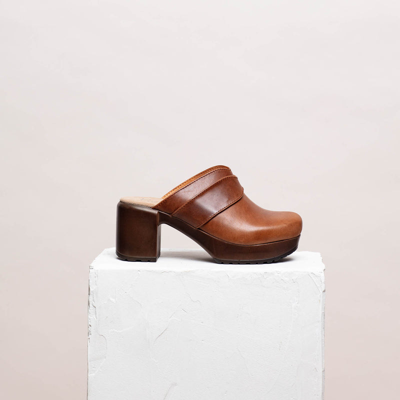 Ada brown leather clog with heel on plinth