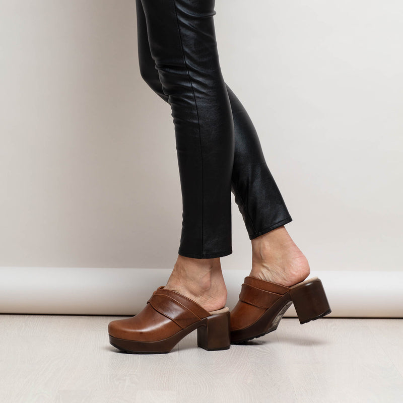 Ada brown leather clog with heel on model